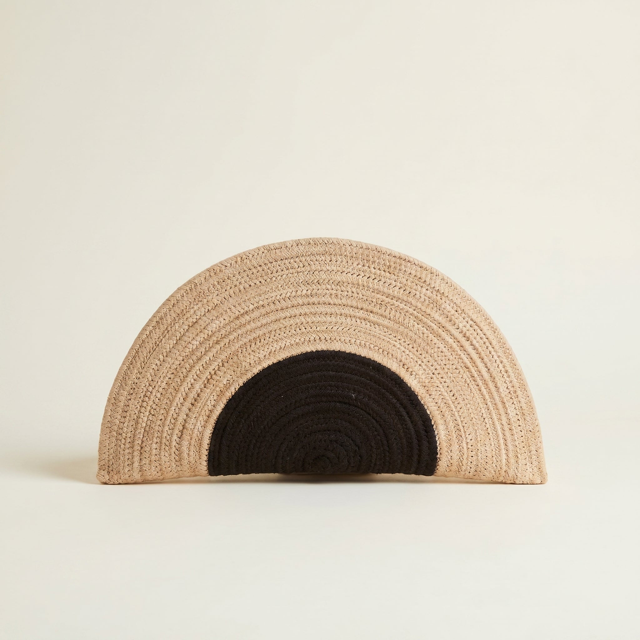 Cassandra handwoven crescent clutch bag by Leila lifestyle view
