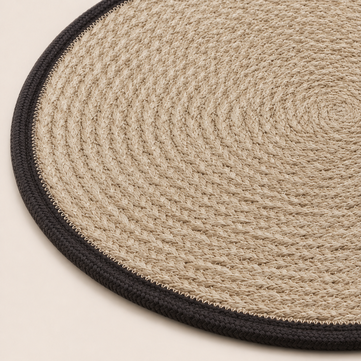 The Braided Jute Border Oval Table Mat