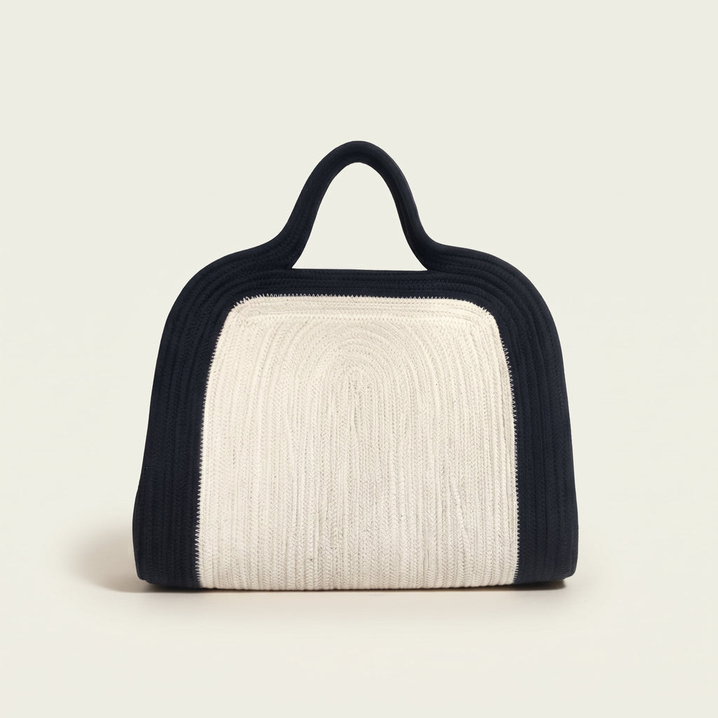 Elainor artisan cotton cord clutch bag with handle by Leila lifestyle view