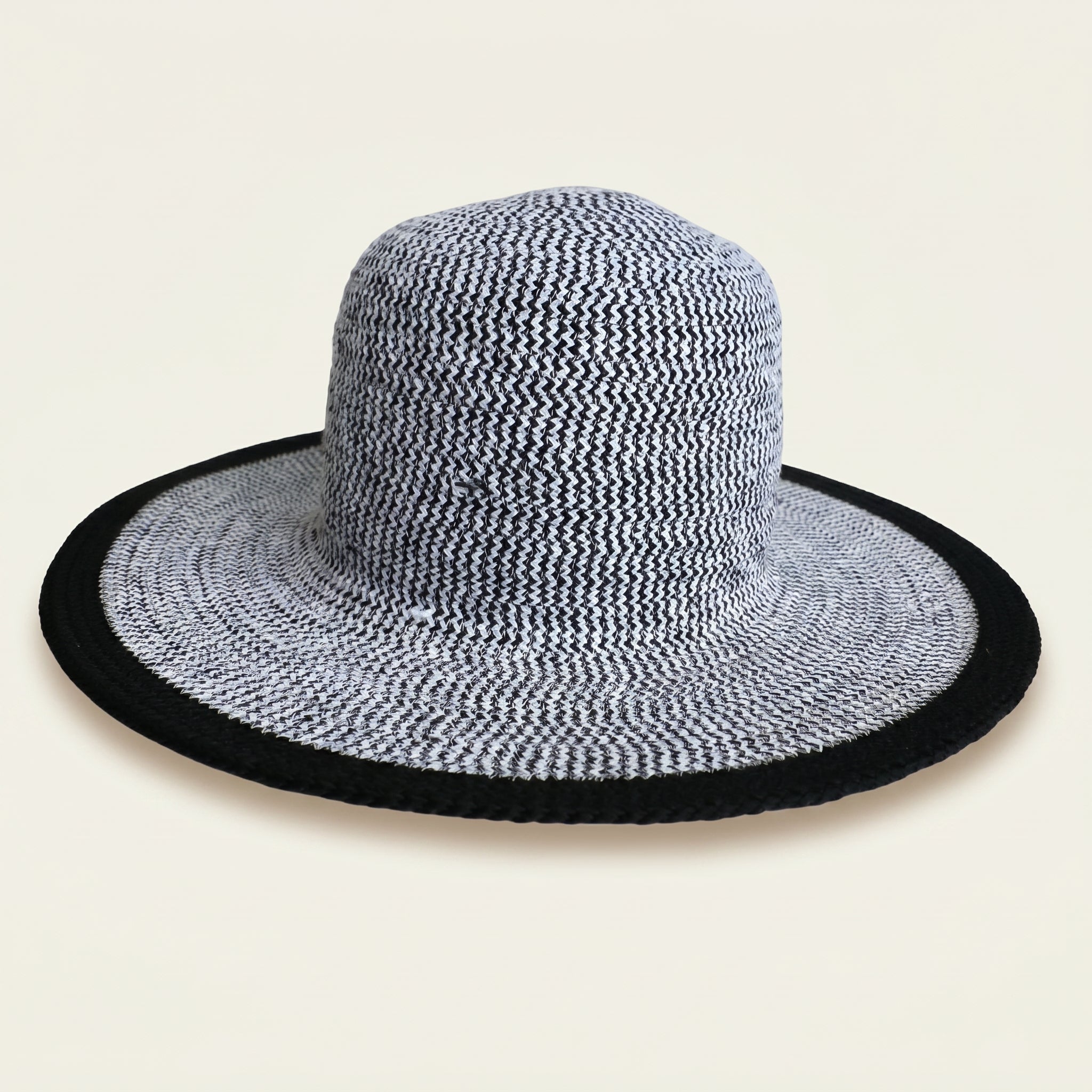 Marina artisan cotton cord sun hat with black border by Leila lifestyle view