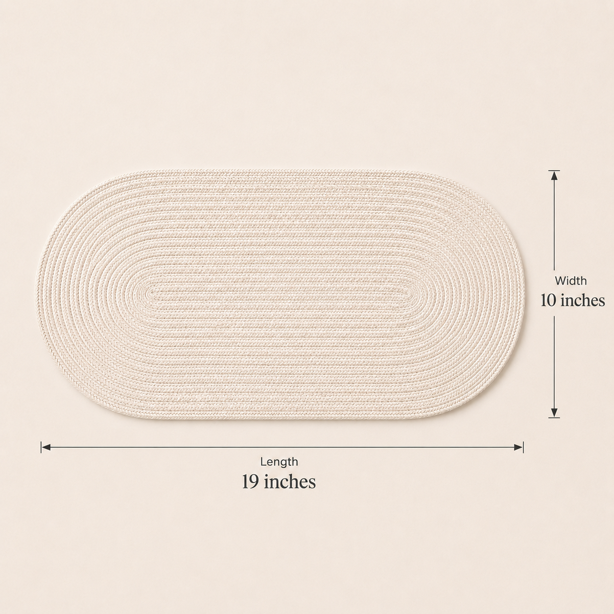 Alabaster oval cotton cord table mat showing 19 inch length and 10 inch width