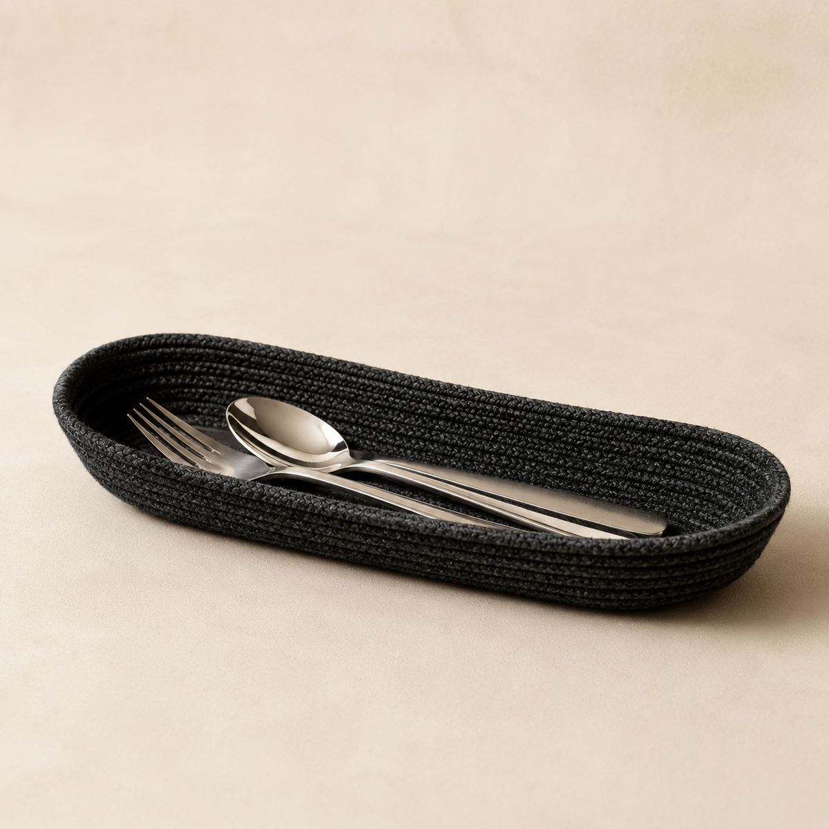Noir cotton cord cutlery holder styled with silver cutlery by Leila Lanka